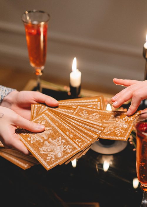 A soothing evening with tarot cards and champagne, creating a mystical and luxurious atmosphere.